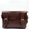The brown leather messenger bag has two compartments.